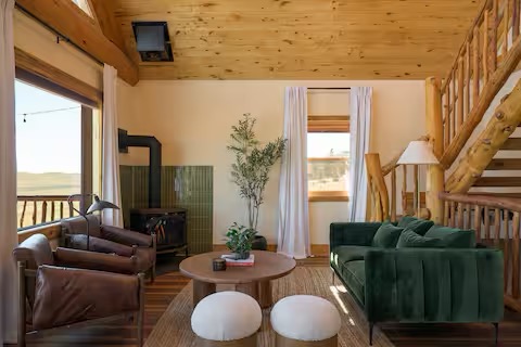 Cozy living room with gas fireplace and mountain cabin ambiance