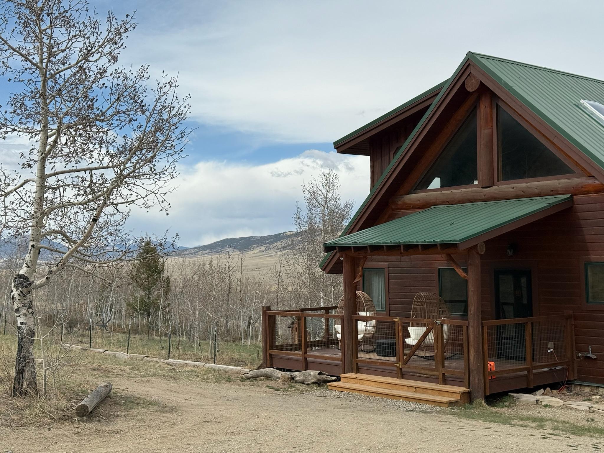 Skyfall Chalet exterior with open South Park valley and mountains beyond